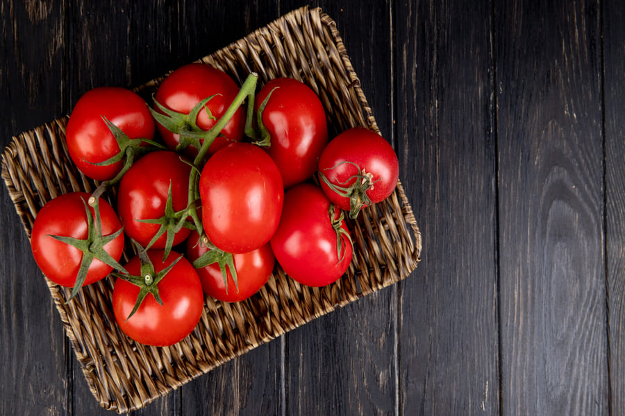 top-view-tomatoes-basket-plate-wood-with-copy-space (1).jpg