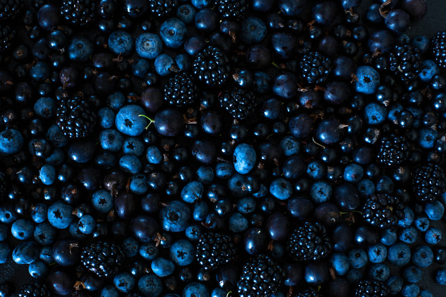 mix-set-layout-different-types-black-berries-black-table-stylish-seasonal-vitamins (1).jpeg