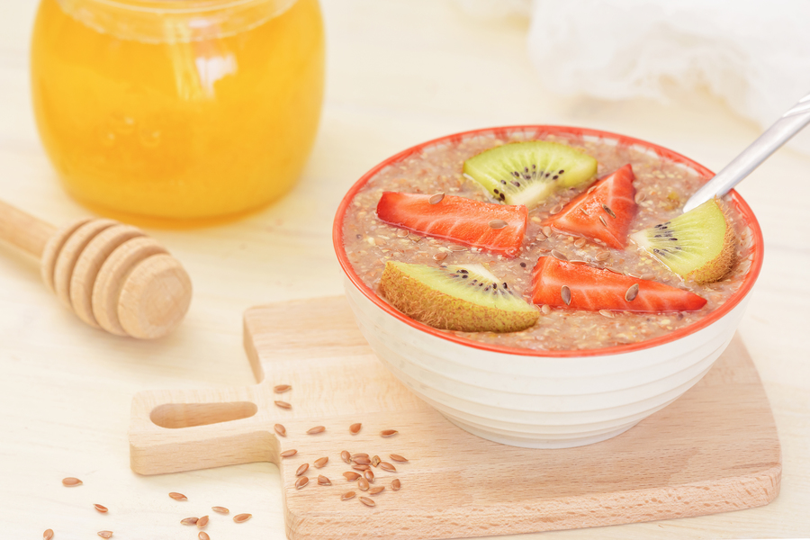 raw-food-vegan-breakfast-flaxseed-porridge-with-honey-strawberries-kiwi (1).jpeg