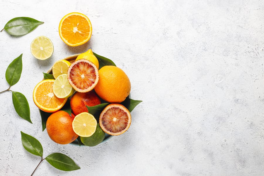 citrus-background-with-assorted-fresh-citrus-fruits (1).jpeg