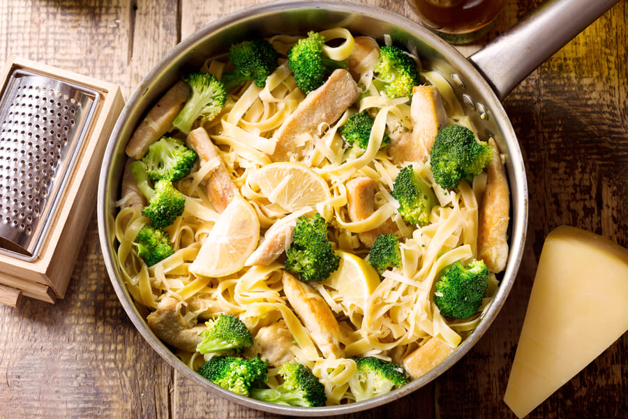 pan-pasta-with-chicken-broccoli-wooden-table-top-view (1).jpeg