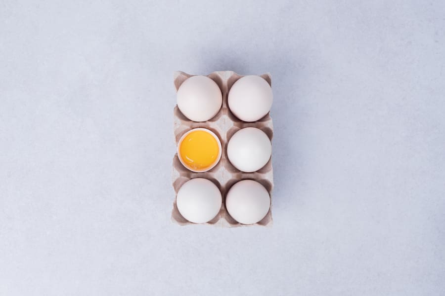 chicken-eggs-paper-container-white-surface (1).jpeg