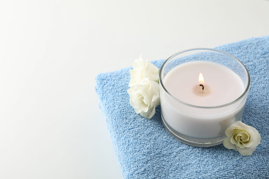 towel-candle-eustoma-white-copy-space-spa-concept (1).jpeg