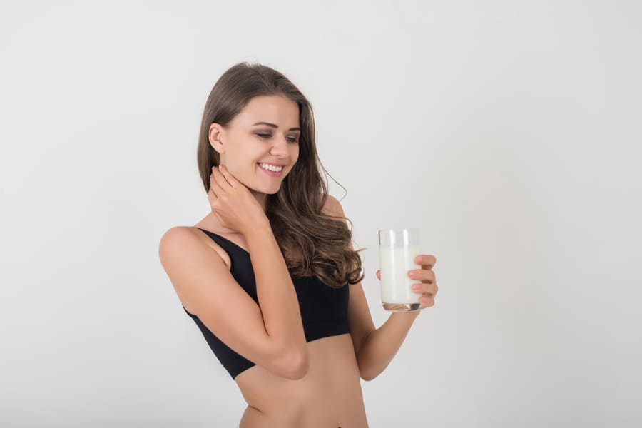 beautiful-young-woman-with-glass-milk (1).jpeg