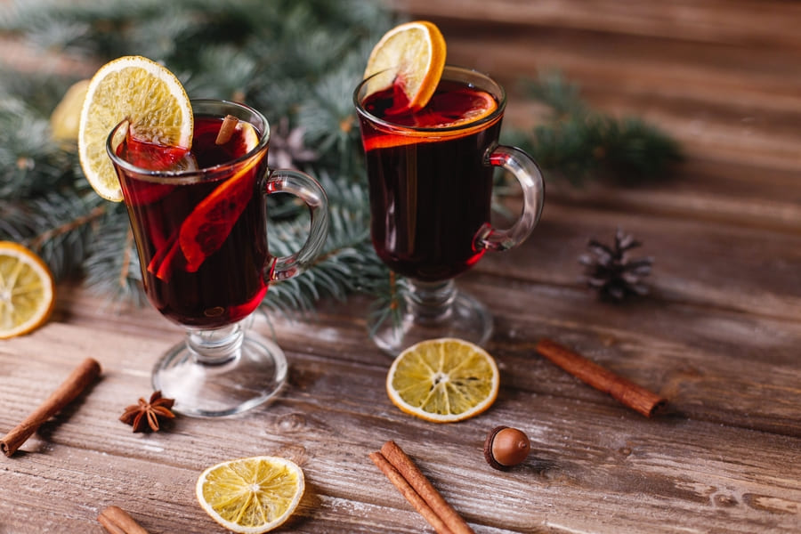 christmas-new-year-decor-two-cups-mulled-wine-with-oranges (1).jpeg