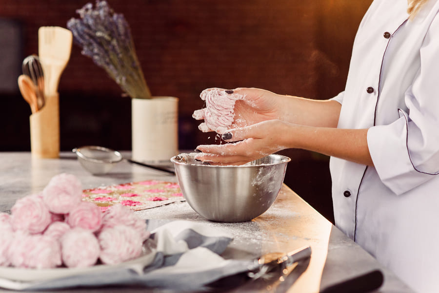 chef-preparing-delicate-homemade-marshmallows-with-her-hands-concept-home-cooking (1).jpeg