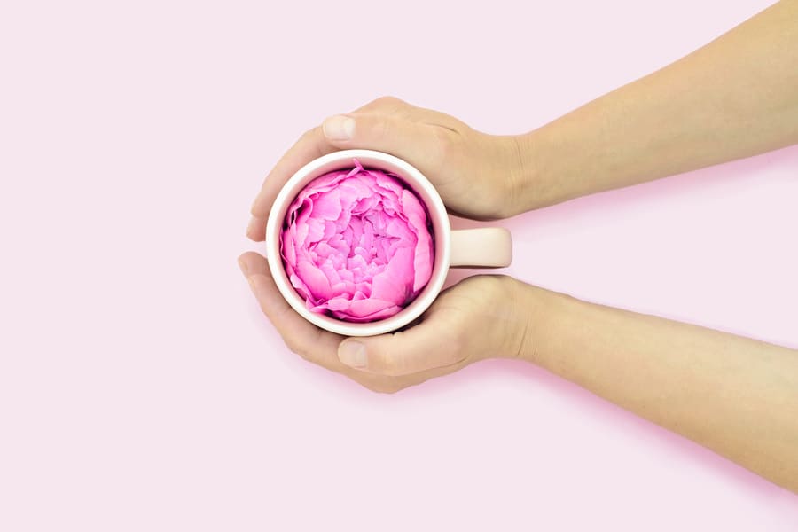summer-flower-tea-female-hands-creative-mug-with-peony-pink-background (1).jpeg