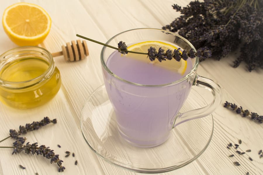 lavender-tea-with-honey-lemon-white-wooden-background (1).jpeg