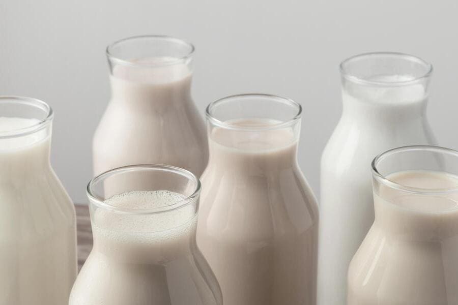 high-angle-bottles-with-variety-milk-types (1).jpeg