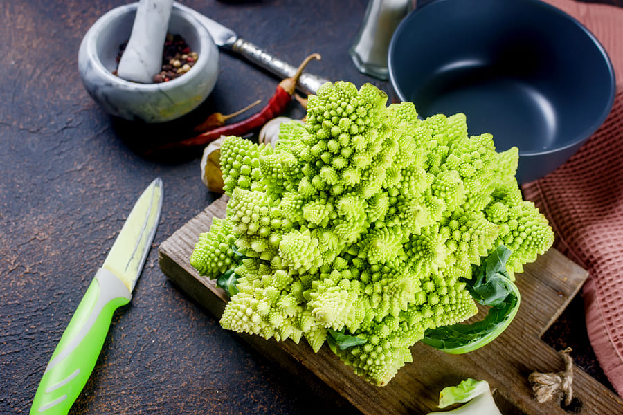 fresh-green-romanesco-raw-organic-cabbage-ready-cooking-cutting-board (1) (1).jpeg