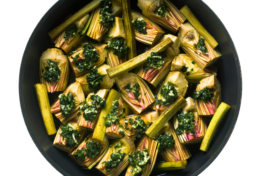 cooking-italian-artichokes-pan-with-sauce-olive-oil-lemon-juice-parsley (1).jpeg