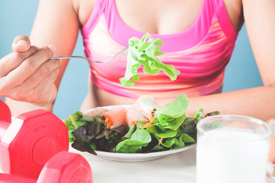 female-fitness-eating-fresh-salad-milk-healthy-lifestyle-concept (1).jpeg